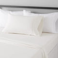 Amazon Basics Lightweight Super Soft Wrinkle Free Breathable Easy Care Microfiber 3 Piece Bed Sheet Set with 14-Inch Deep Pockets, Twin XL, Cream, Solid