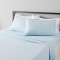 Amazon Basics Lightweight Super Soft Easy Care Microfiber 4-Piece Bed Sheet Set with 14-Inch Deep Pockets, Solid, King, Light Blue