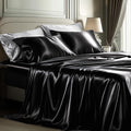 Bedsure Black Satin Sheets King Size - 4 Piece Silky Bedsheets with 15 Inches Deep Pocket Fitted Bedsheet,1 Flat Sheet, 2 Satin Pillowcases, Good for Hair & Skin (King, Black)